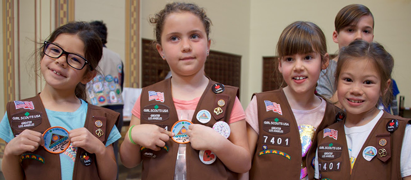 a group of girl scouts during a visit to central library