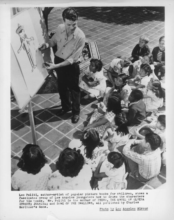 Author Leo Politi reads to children in the Children’s Literature Department