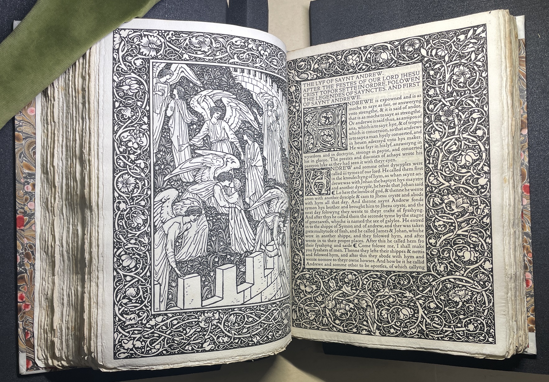 The two-page spread with a woodcut image and the beginning of the story of Saint Andrew