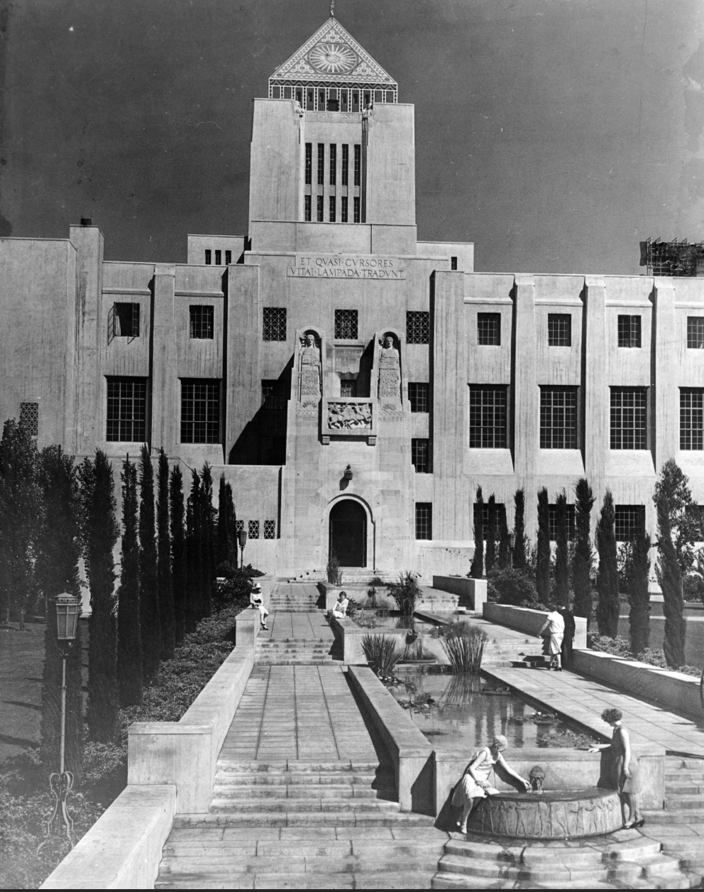 Tiered pools flanked by tree-lined walkways of Central Library 1929