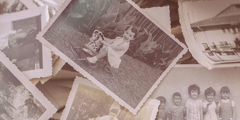 collection of aged photographs overlaying one another