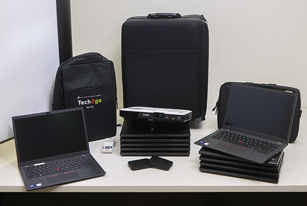 laptops, projector, rolling case